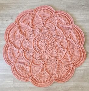 tapete redondo tejido a crochet en color salmon