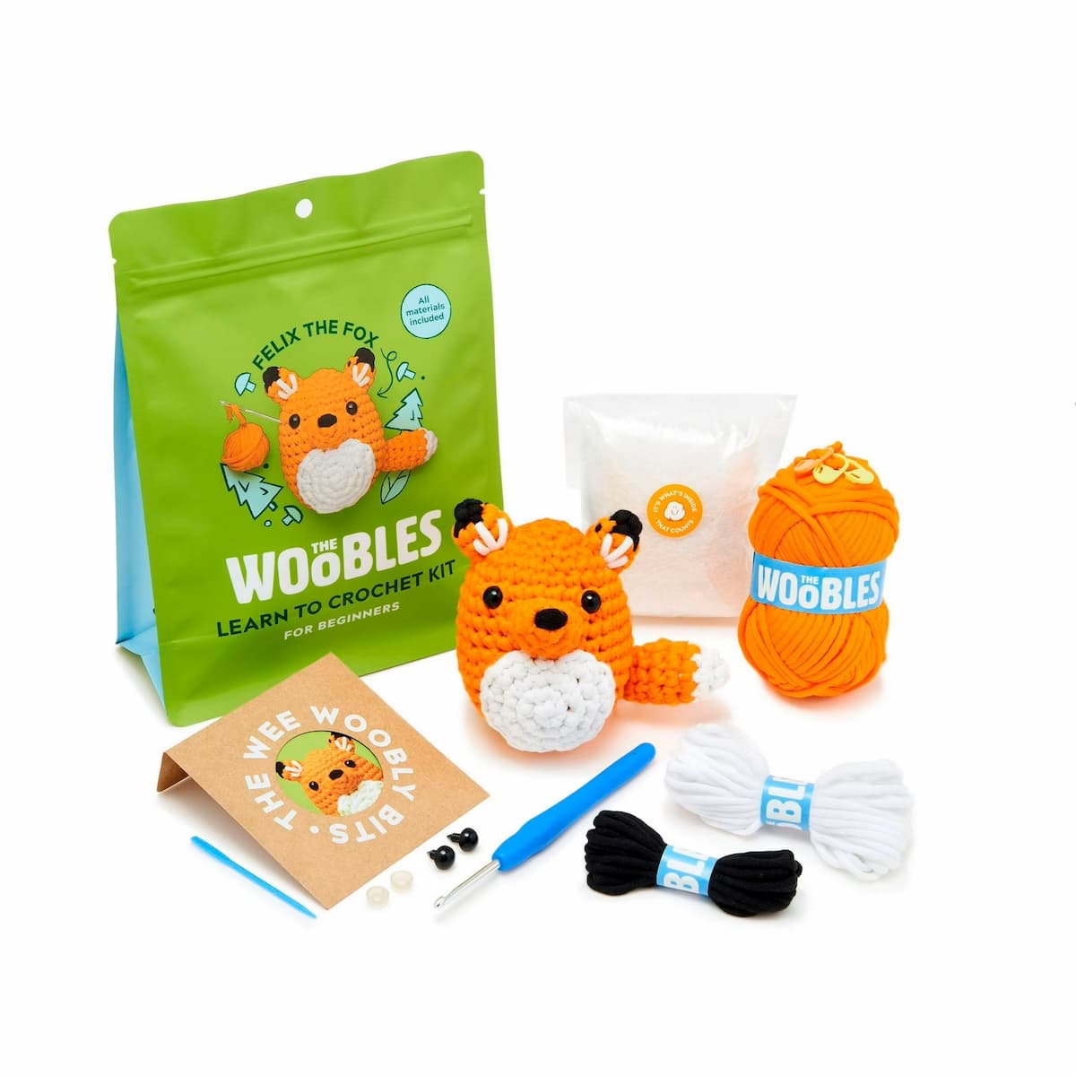 Kit de crochet para principiantes de The Woobles con todos los materiales para tejer un amigurumi para principiantes de zorro naranja, incluye ovillos, aguja, ojos de seguridad, relleno y bolsa de presentación